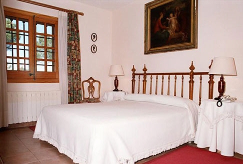 Schlafzimmer der Landhaus-residence bei Cassa de la Selva